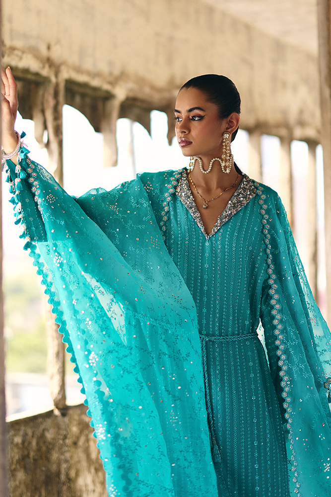Model wearing NAIDA, close-up detail, a Pakistani designer outfit by Suffuse, available online in the UK.