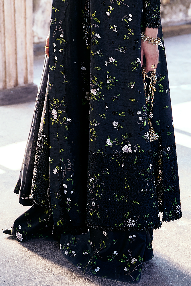 Model wearing ZEYARA, side angle, a Pakistani designer outfit by Suffuse, available online in the UK.