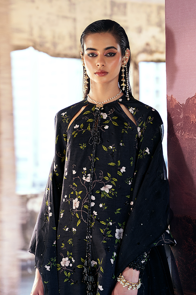 Model wearing ZEYARA, back view, a Pakistani designer outfit by Suffuse, available online in the UK.