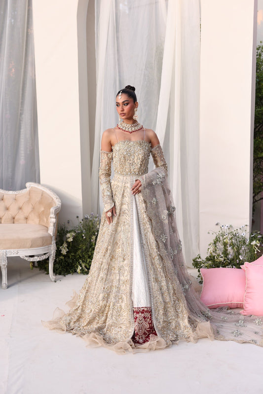 Model wearing champagne gold bridal gown Juni from Mysie By Tahira Wedding Edits '25, Pakistani luxury pret and clothes online in UK.