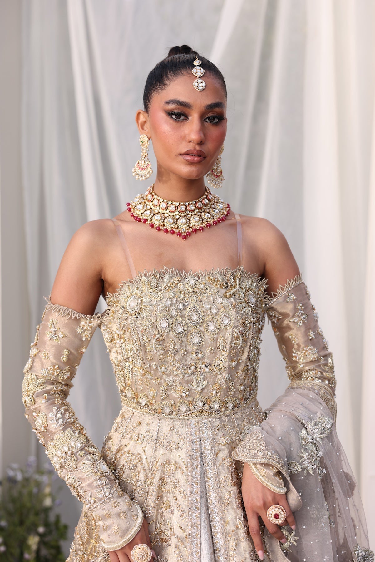 Model wearing champagne gold bridal gown Juni from Mysie By Tahira Wedding Edits '25, Pakistani luxury pret and clothes online in UK.