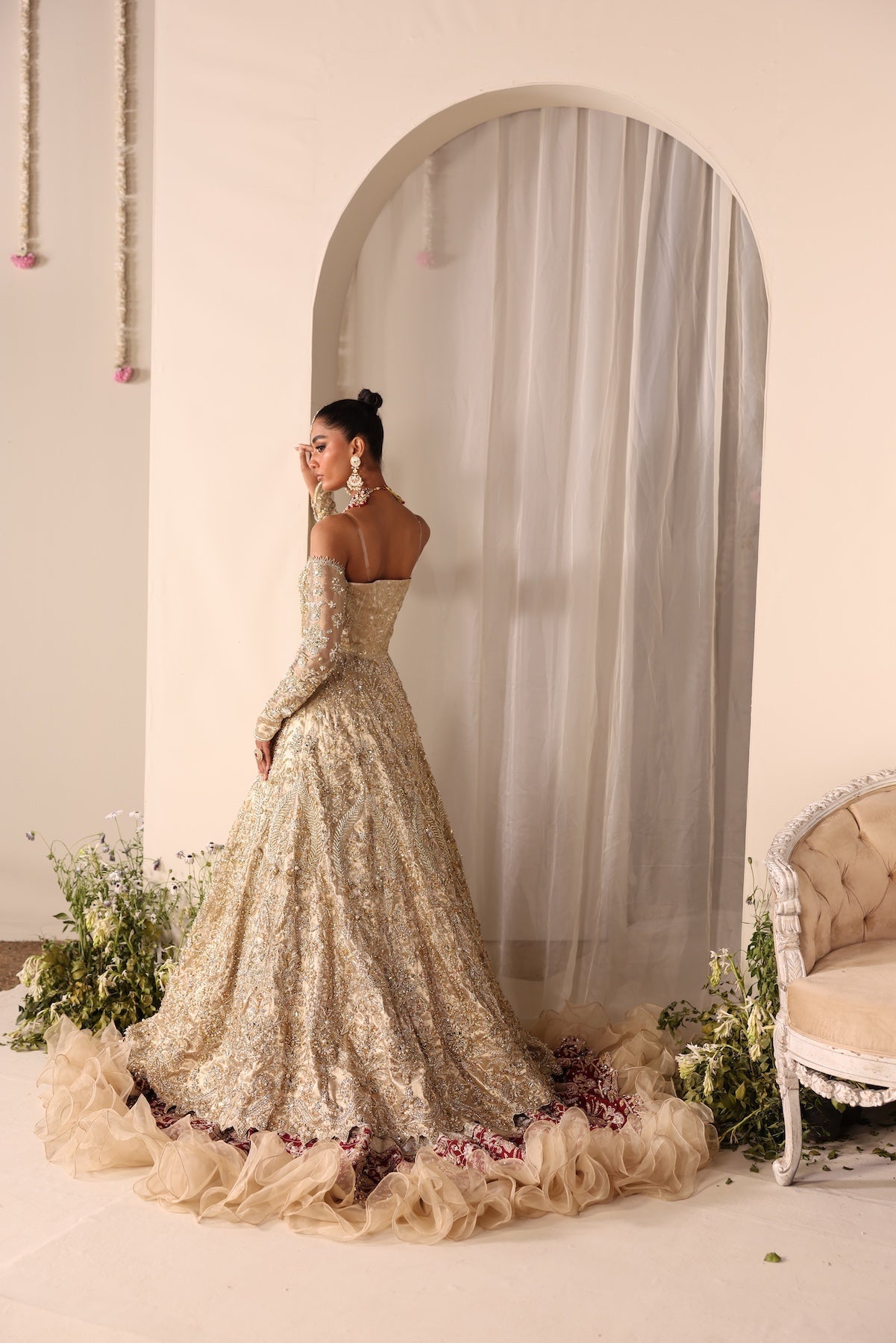 Model wearing champagne gold bridal gown Juni from Mysie By Tahira Wedding Edits '25, Pakistani luxury pret and clothes online in UK.