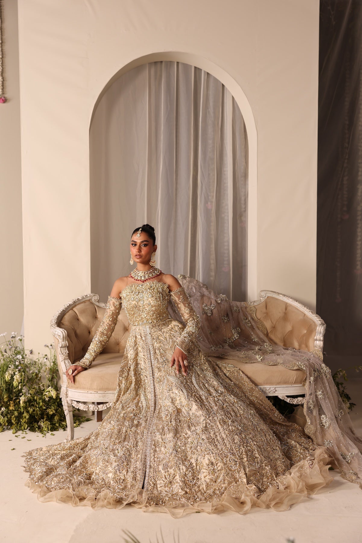 Model wearing champagne gold bridal gown Juni from Mysie By Tahira Wedding Edits '25, Pakistani luxury pret and clothes online in UK.