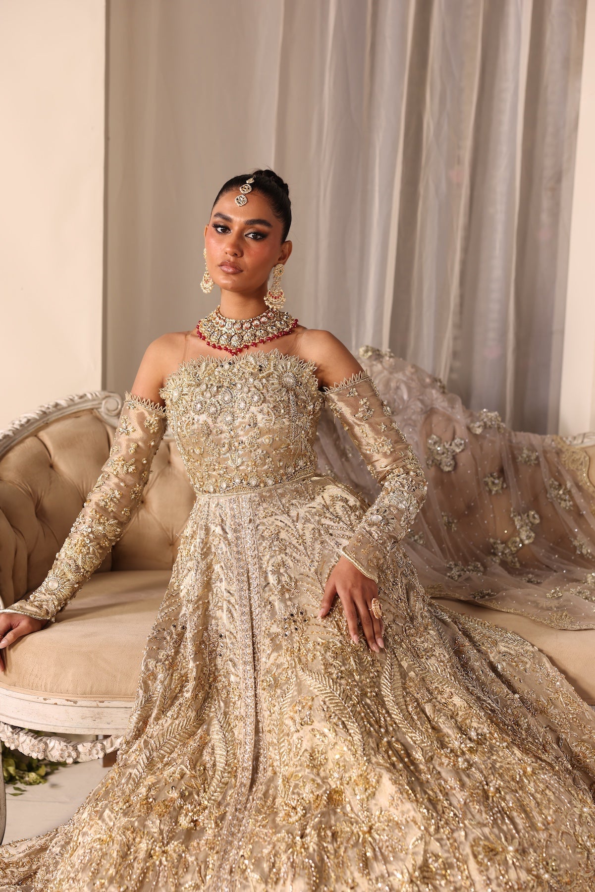 Model wearing champagne gold bridal gown Juni from Mysie By Tahira Wedding Edits '25, Pakistani luxury pret and clothes online in UK.