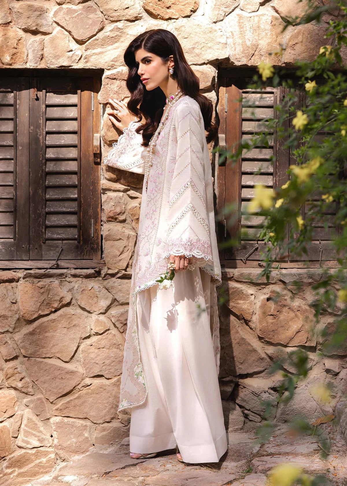 Model wearing ivory Amelia outfit from Kanwal Malik Ayra Casual Pret '25, Pakistani luxury pret and Pakistani clothes online in UK.