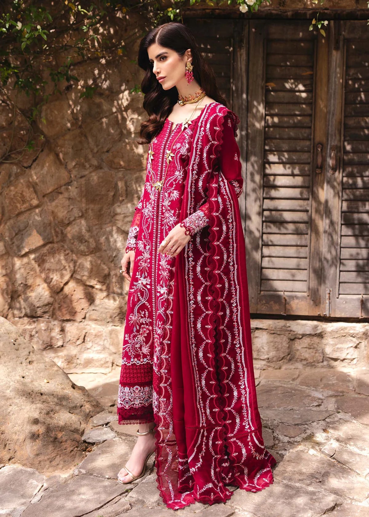 Model wearing deep red Cecil outfit from Kanwal Malik Ayra Casual Pret '25, showcasing Pakistani luxury pret and Pakistani clothes online in UK.