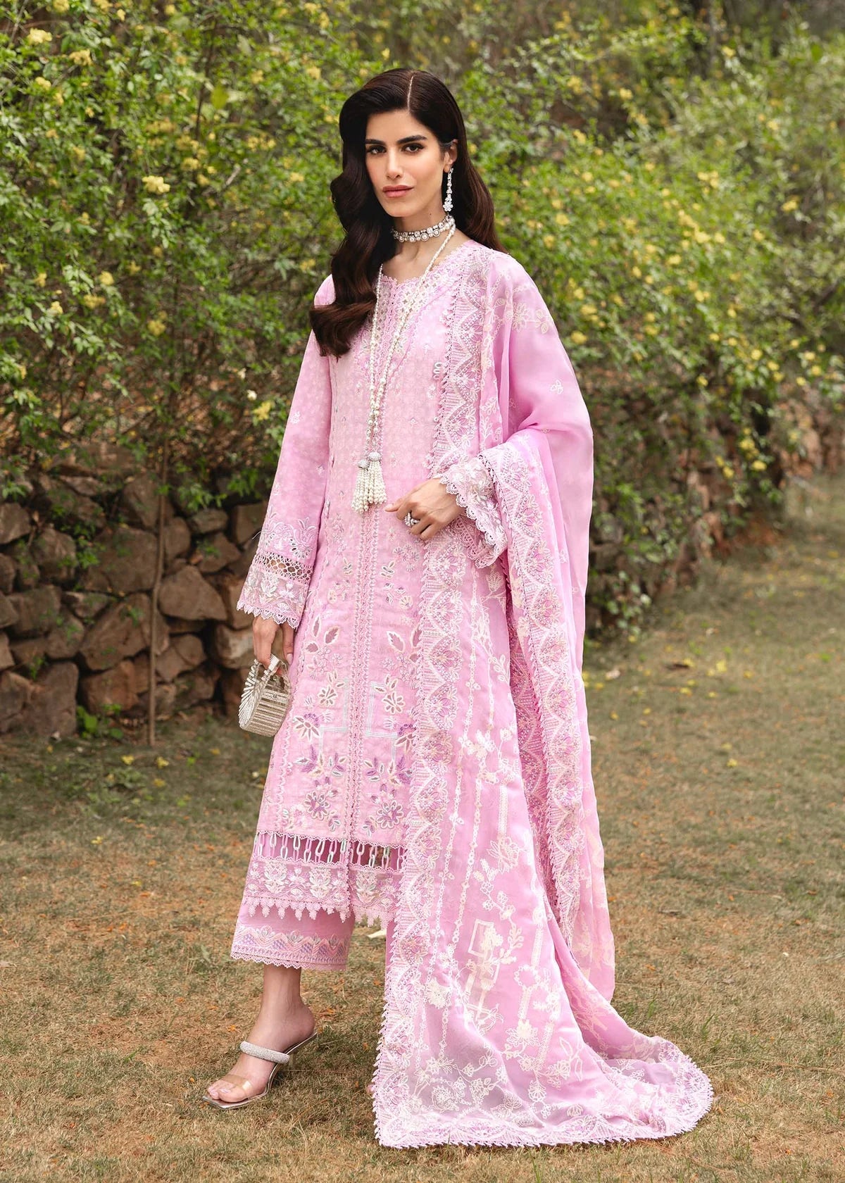 Model wearing pastel pink Maisie outfit from Kanwal Malik Ayra Casual Pret '25, featuring intricate embroidery and Pakistani luxury pret style available for Pakistani clothes online in UK.