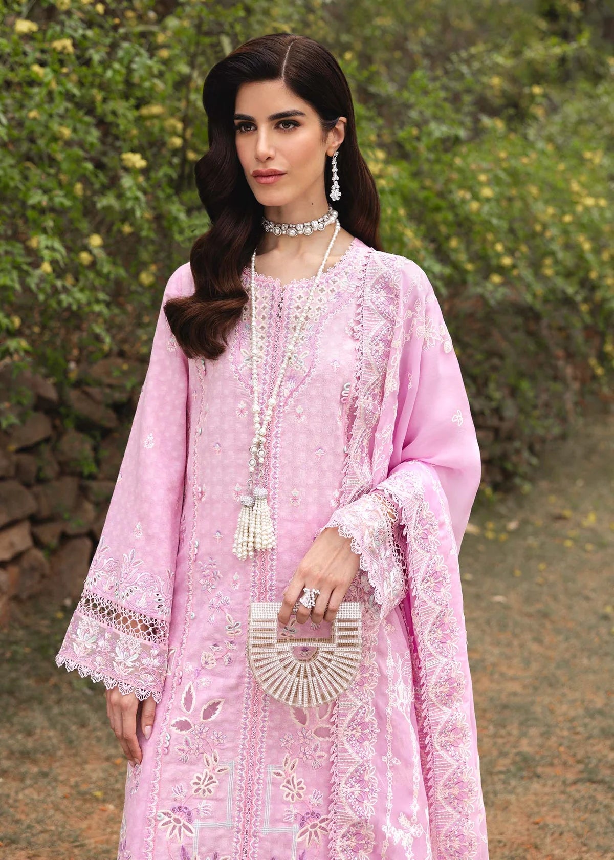 Model wearing pastel pink Maisie outfit from Kanwal Malik Ayra Casual Pret '25, featuring intricate embroidery and Pakistani luxury pret style available for Pakistani clothes online in UK.