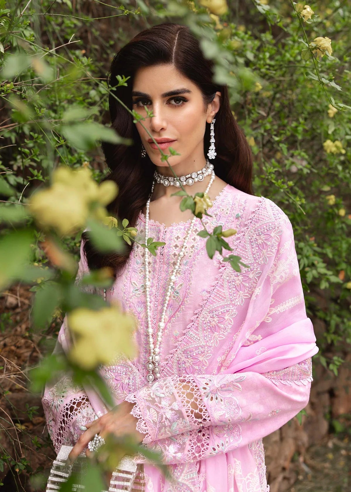 Model wearing pastel pink Maisie outfit from Kanwal Malik Ayra Casual Pret '25, featuring intricate embroidery and Pakistani luxury pret style available for Pakistani clothes online in UK.