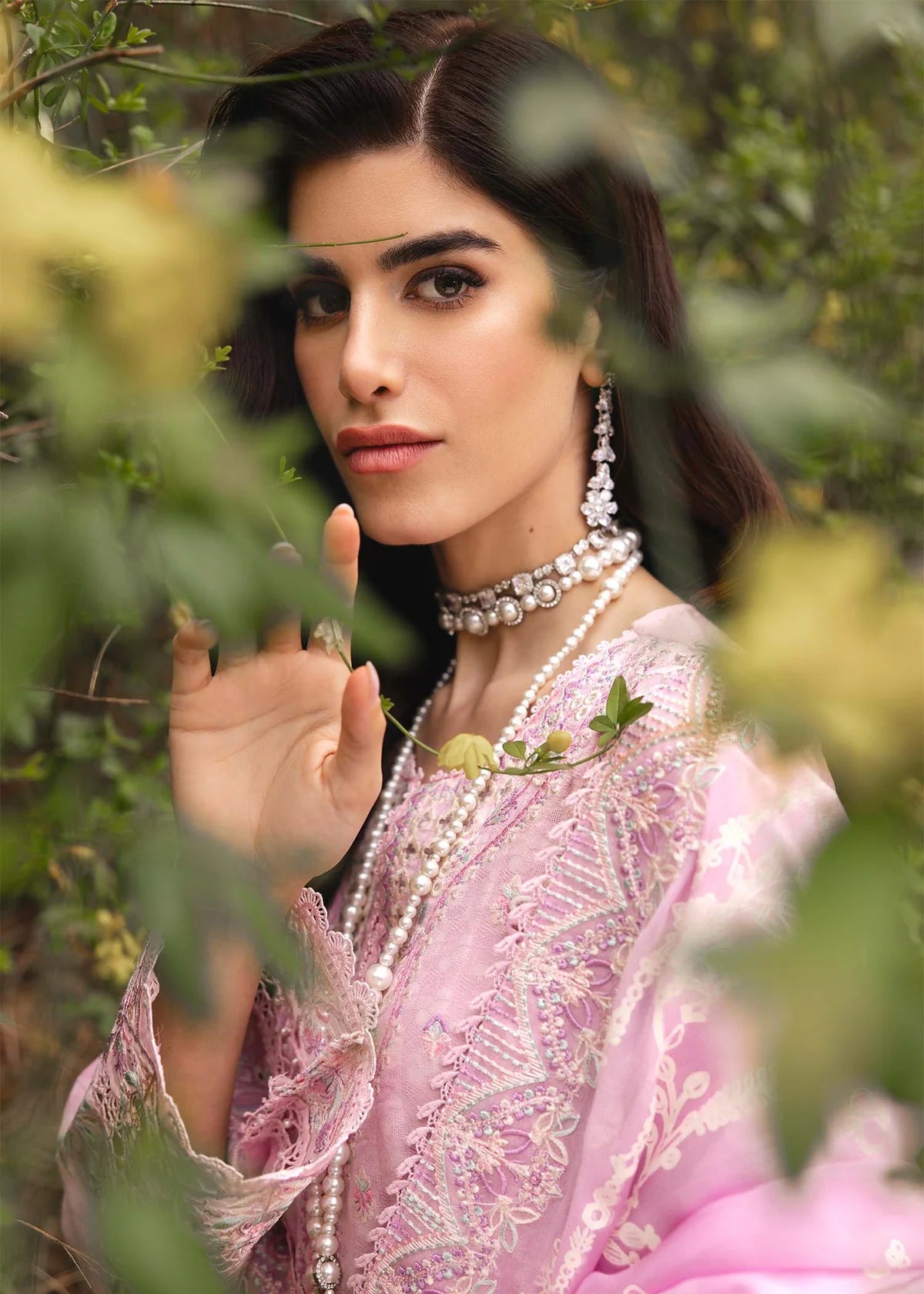 Model wearing pastel pink Maisie outfit from Kanwal Malik Ayra Casual Pret '25, featuring intricate embroidery and Pakistani luxury pret style available for Pakistani clothes online in UK.
