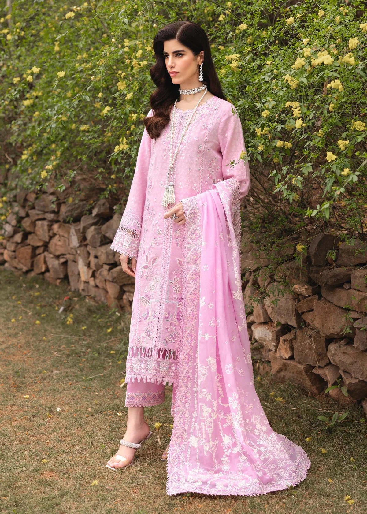 Model wearing pastel pink Maisie outfit from Kanwal Malik Ayra Casual Pret '25, featuring intricate embroidery and Pakistani luxury pret style available for Pakistani clothes online in UK.