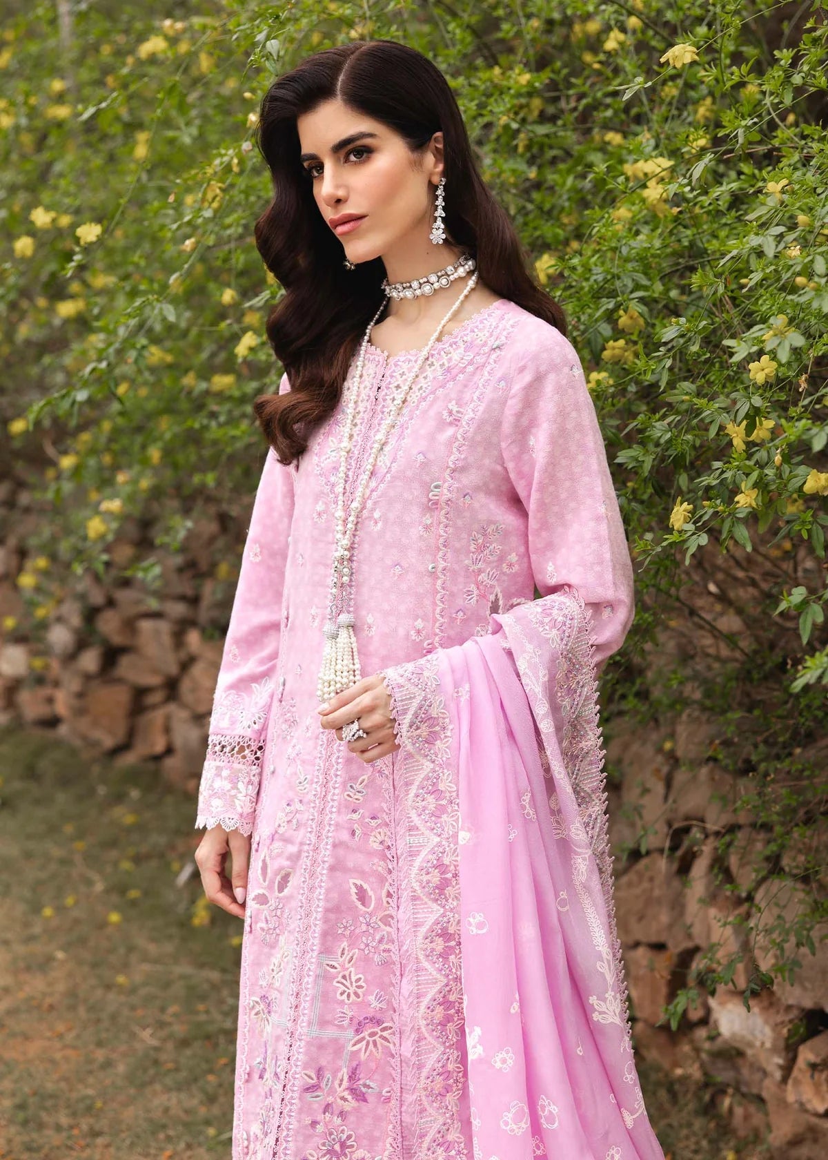 Model wearing pastel pink Maisie outfit from Kanwal Malik Ayra Casual Pret '25, featuring intricate embroidery and Pakistani luxury pret style available for Pakistani clothes online in UK.