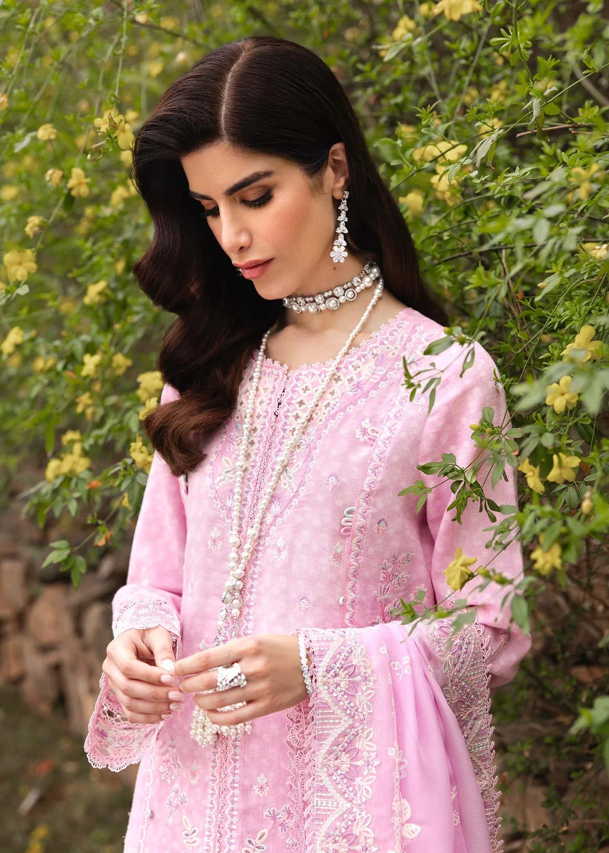 Model wearing pastel pink Maisie outfit from Kanwal Malik Ayra Casual Pret '25, featuring intricate embroidery and Pakistani luxury pret style available for Pakistani clothes online in UK.