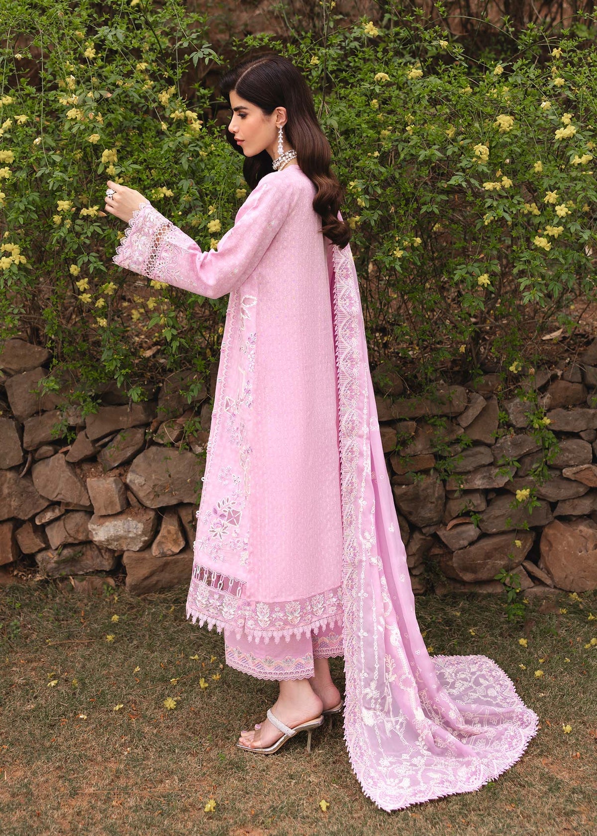 Model wearing pastel pink Maisie outfit from Kanwal Malik Ayra Casual Pret '25, featuring intricate embroidery and Pakistani luxury pret style available for Pakistani clothes online in UK.