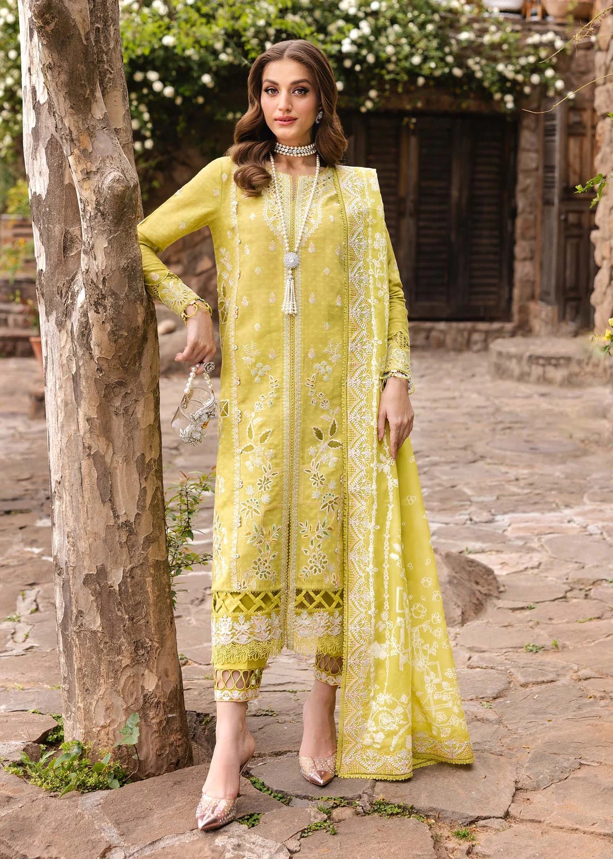 Model wearing bright yellow Silvia outfit from Kanwal Malik Ayra Casual Pret '25, showcasing Pakistani luxury pret and Pakistani clothes online in UK.