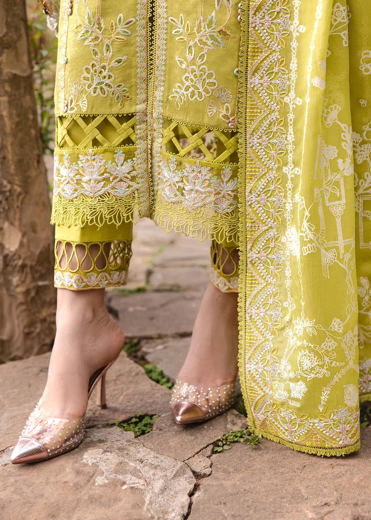 Model wearing bright yellow Silvia outfit from Kanwal Malik Ayra Casual Pret '25, showcasing Pakistani luxury pret and Pakistani clothes online in UK.