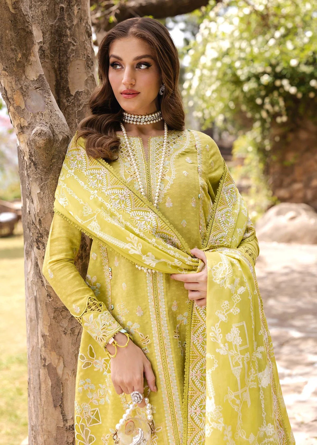Model wearing bright yellow Silvia outfit from Kanwal Malik Ayra Casual Pret '25, showcasing Pakistani luxury pret and Pakistani clothes online in UK.
