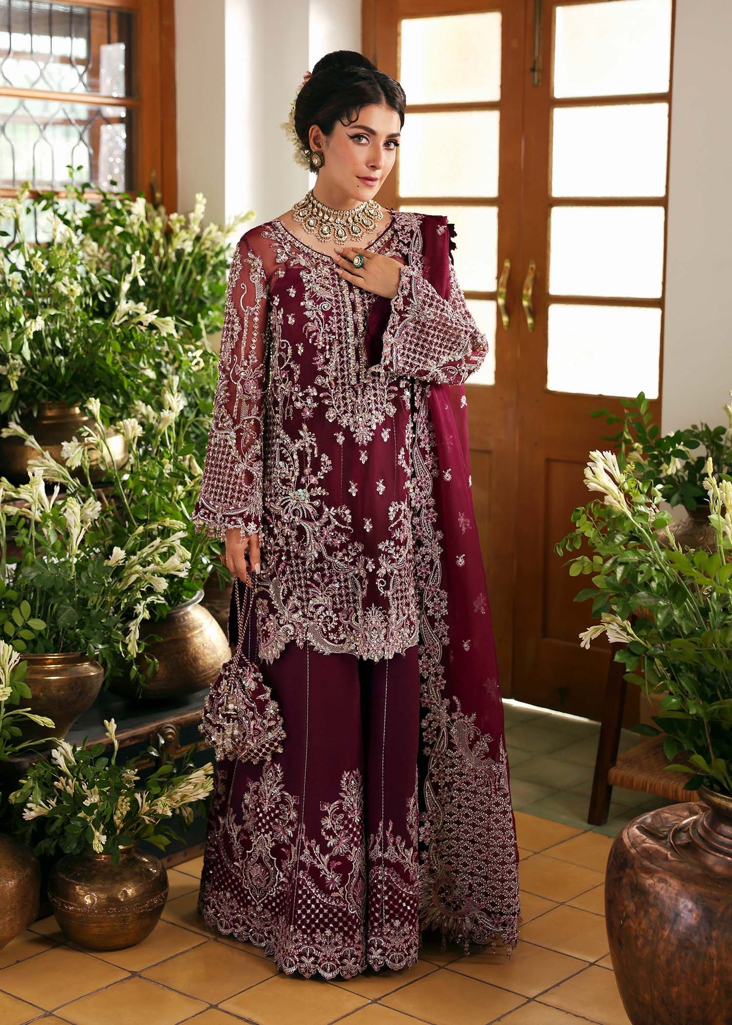 Model wearing Safiya by Kanwal Malik in deep maroon embroidered ensemble – Pakistani luxury pret outfit available online in UK.