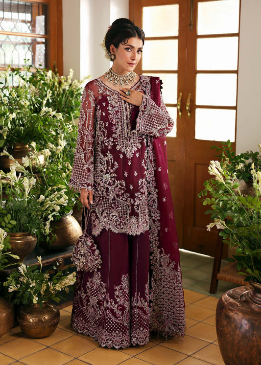 Model wearing Safiya by Kanwal Malik in deep maroon embroidered ensemble – Pakistani luxury pret outfit available online in UK.