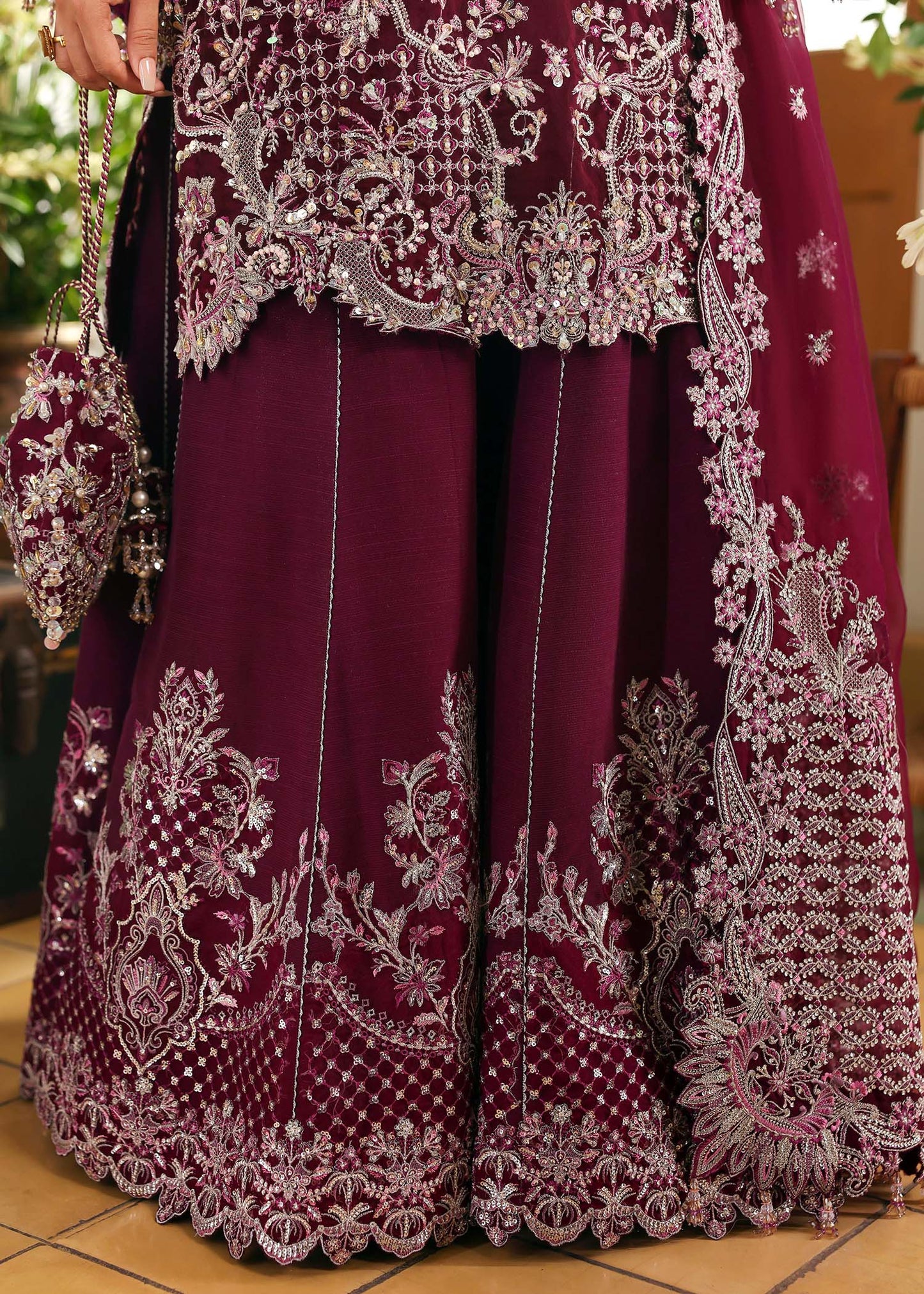 Model wearing Safiya by Kanwal Malik in deep maroon embroidered ensemble – Pakistani luxury pret outfit available online in UK.
