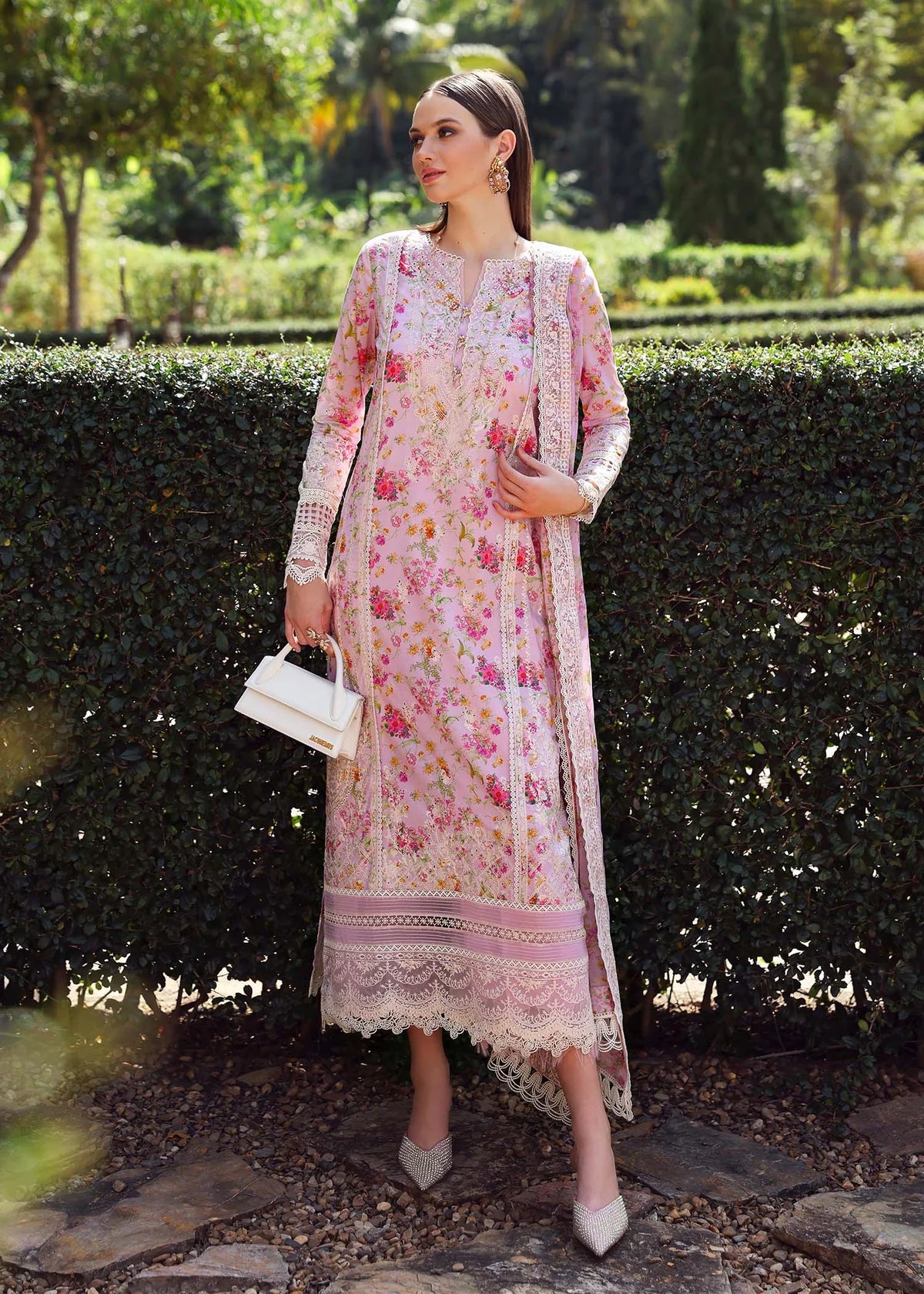 Model wearing pastel pink floral Zuri dress from Kanwal Malik Zaina Lawn '25, perfect for Pakistani luxury pret and clothes online in UK.