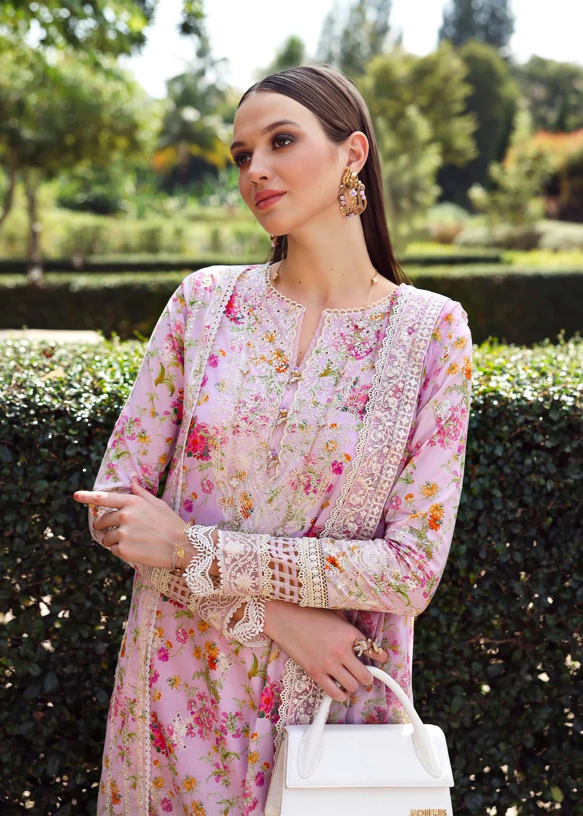 Model wearing pastel pink floral Zuri dress from Kanwal Malik Zaina Lawn '25, perfect for Pakistani luxury pret and clothes online in UK.