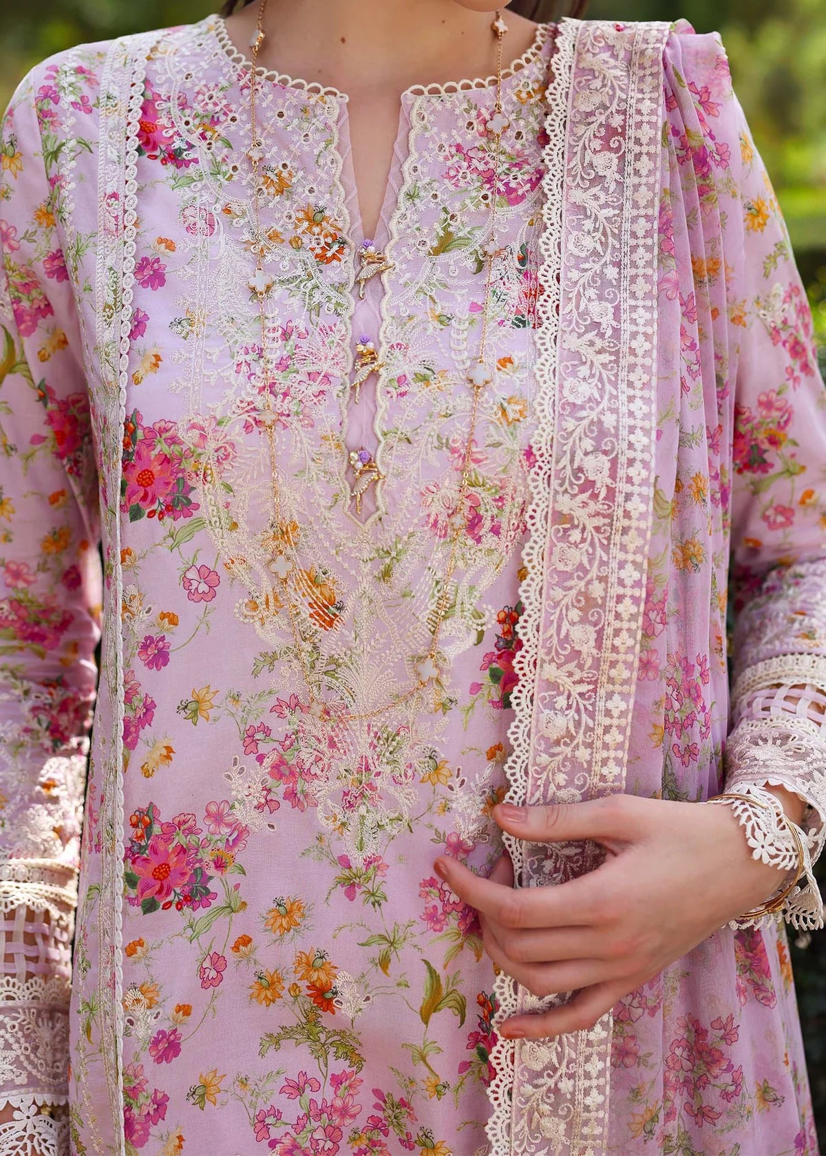 Model wearing pastel pink floral Zuri dress from Kanwal Malik Zaina Lawn '25, perfect for Pakistani luxury pret and clothes online in UK.