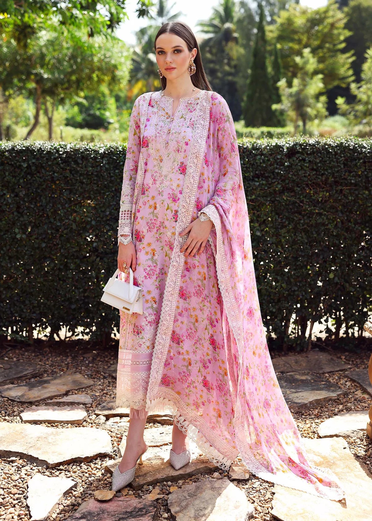Model wearing pastel pink floral Zuri dress from Kanwal Malik Zaina Lawn '25, perfect for Pakistani luxury pret and clothes online in UK.
