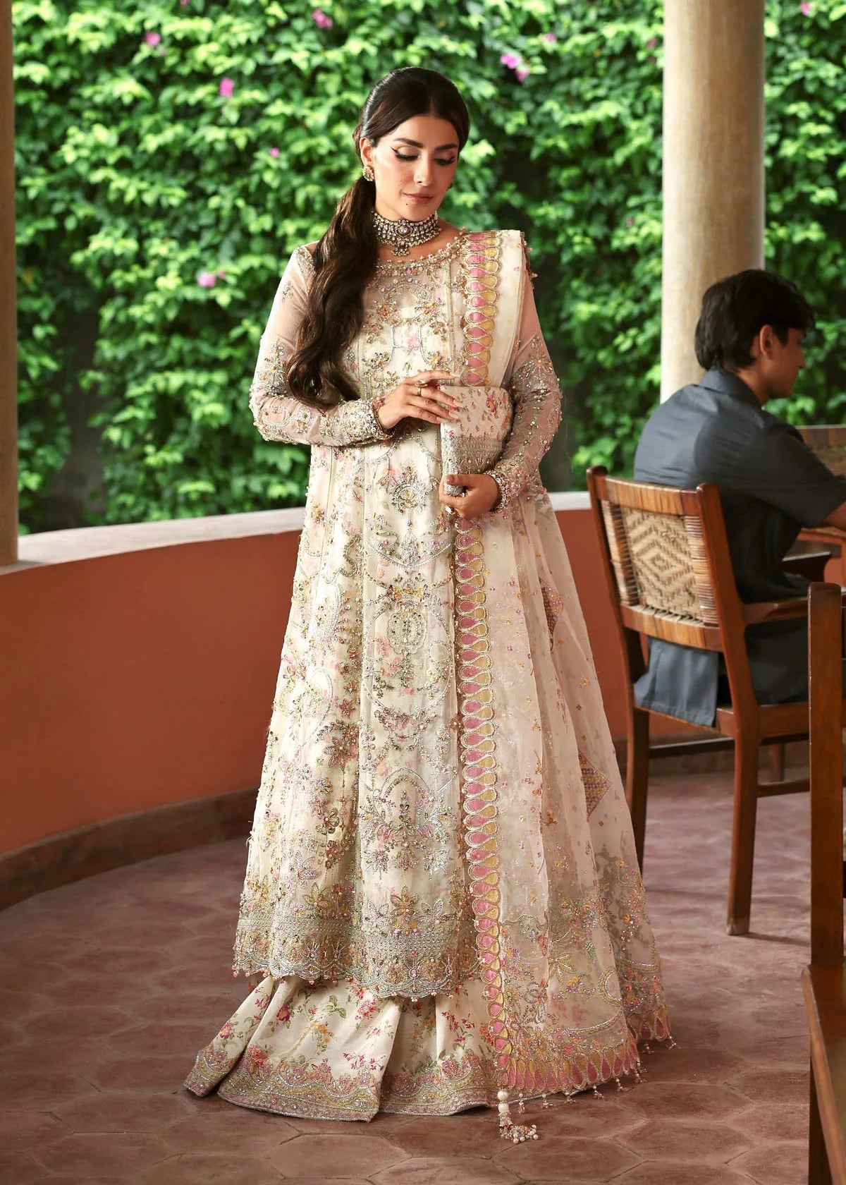 Model wearing Chanda by Kanwal Malik in ivory and pastel pink – Pakistani luxury pret outfit online in UK, ideal for festive occasions.