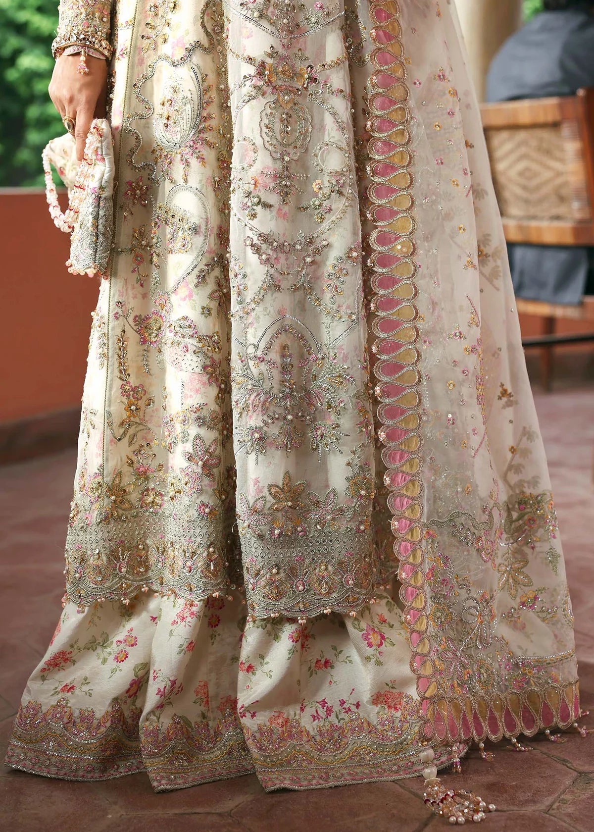 Model wearing Chanda by Kanwal Malik in ivory and pastel pink – Pakistani luxury pret outfit online in UK, ideal for festive occasions.