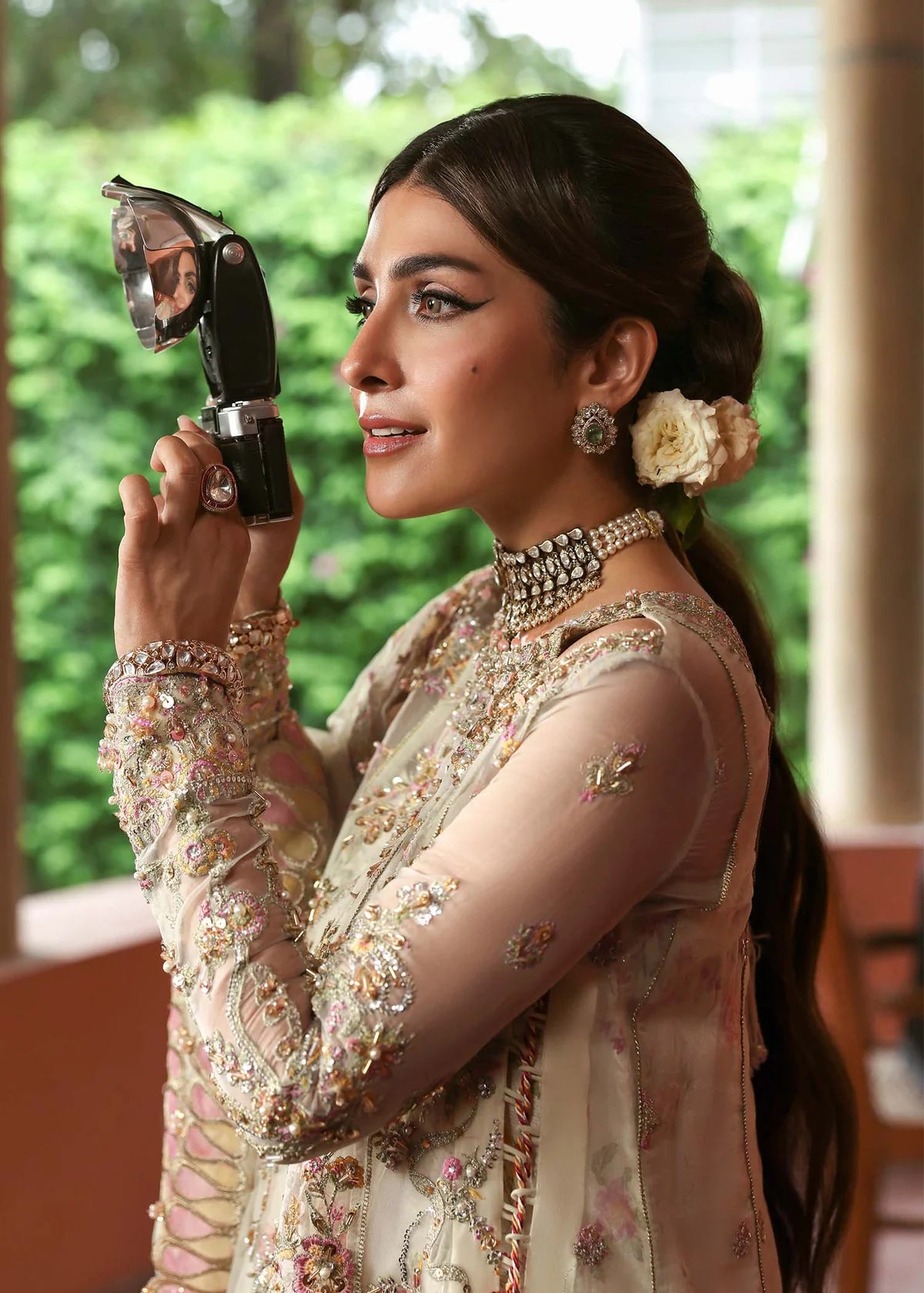 Model wearing Chanda by Kanwal Malik in ivory and pastel pink – Pakistani luxury pret outfit online in UK, ideal for festive occasions.