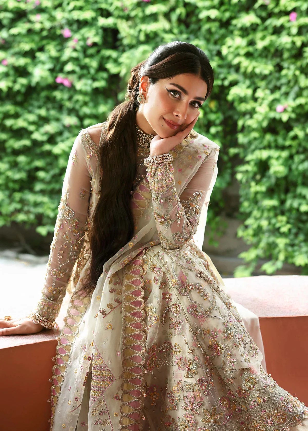 Model wearing Chanda by Kanwal Malik in ivory and pastel pink – Pakistani luxury pret outfit online in UK, ideal for festive occasions.