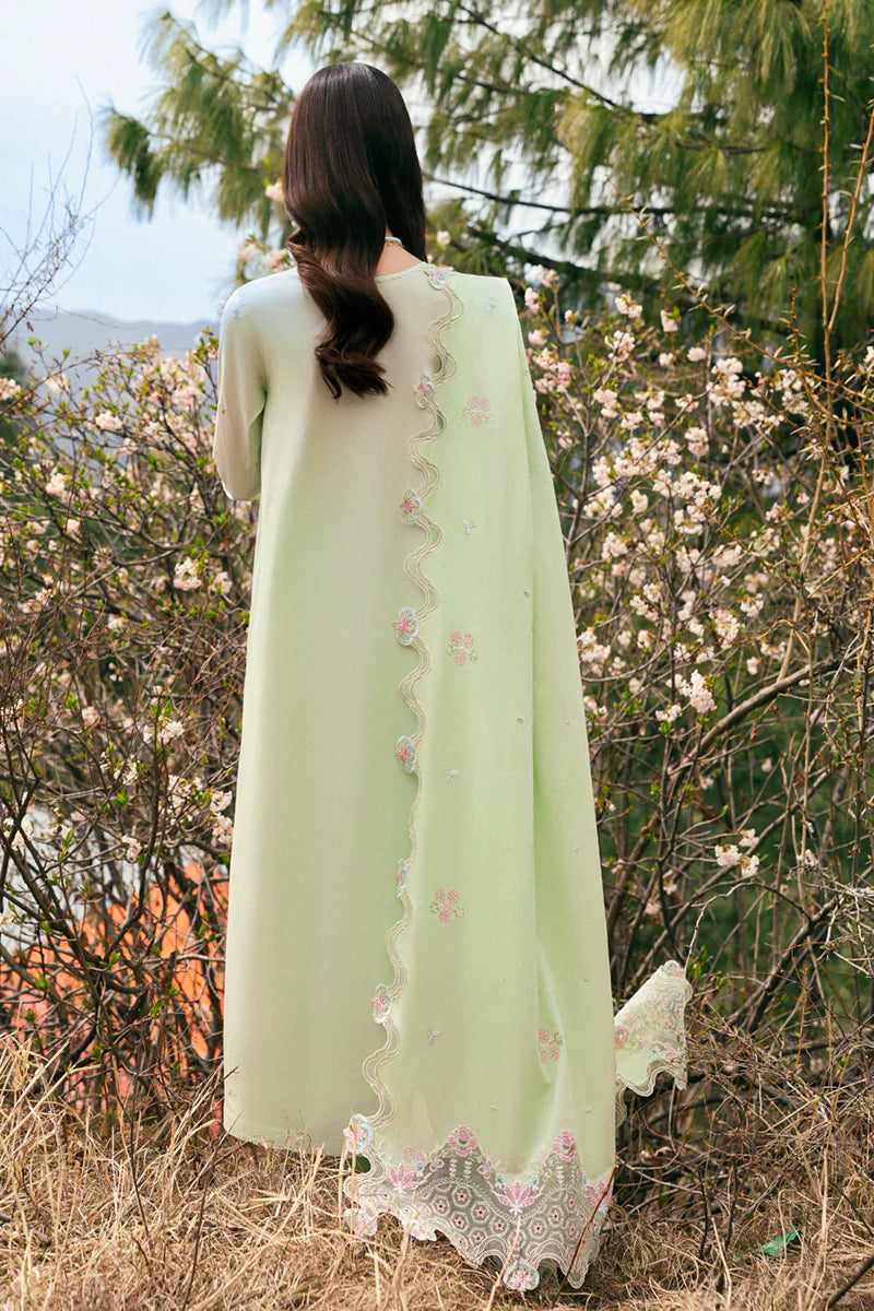 Model wearing pastel green DC-14 Meline from Qalamkar Qlinekari Lawn '25, Pakistani Luxury pret, Pakistani clothes online in UK.