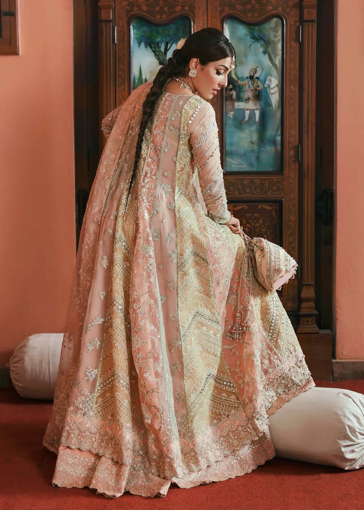 Model wearing Mehar by Kanwal Malik in soft peach pink embroidered ensemble – Pakistani luxury pret dress available online in UK for festive wear.
