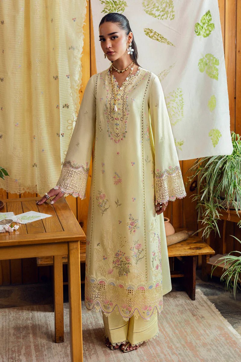 Model wearing pale yellow DC-04 Keva from Qalamkar Qlinekari Lawn '25, Pakistani Luxury pret, Pakistani clothes online in UK.