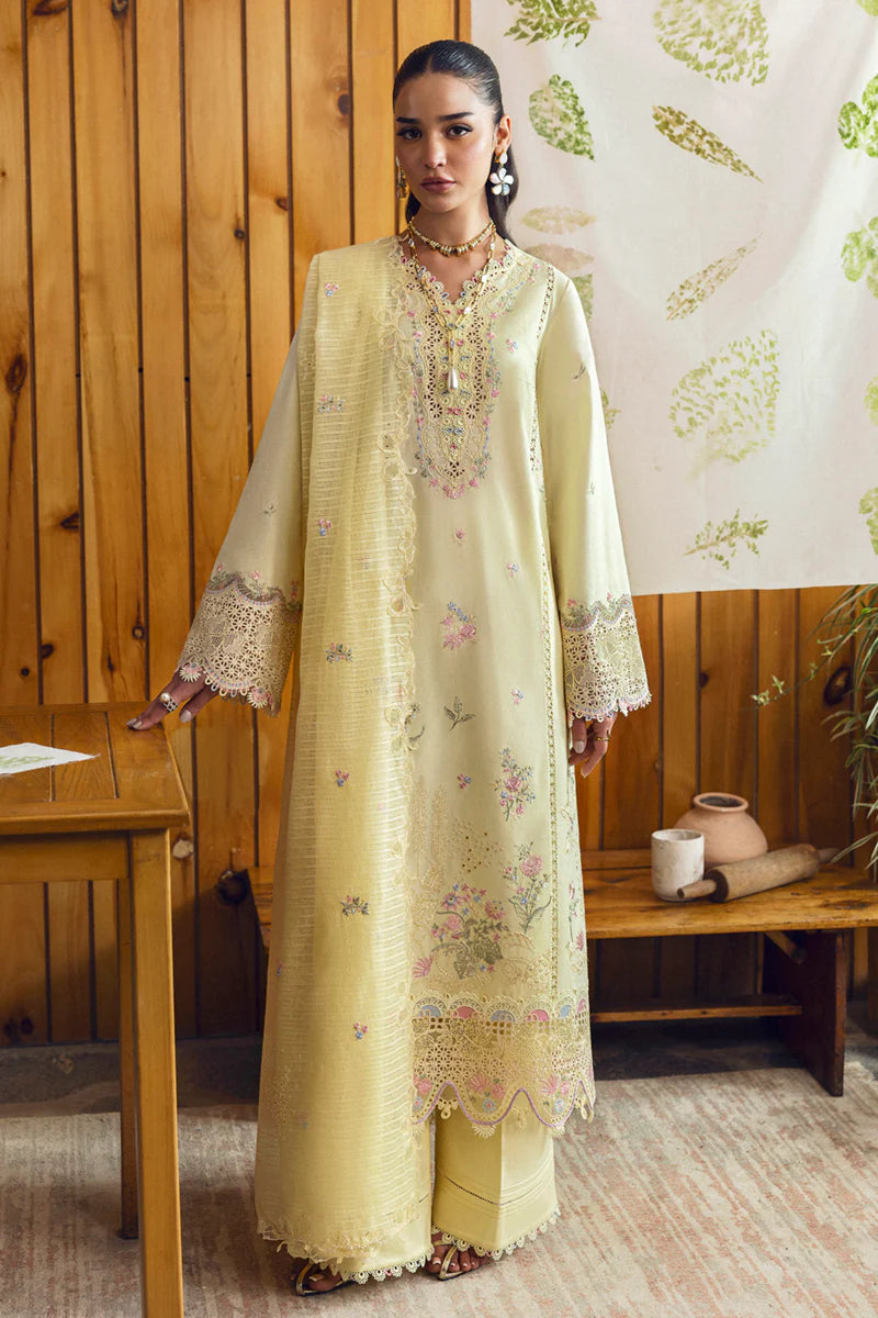 Model wearing pale yellow DC-04 Keva from Qalamkar Qlinekari Lawn '25, Pakistani Luxury pret, Pakistani clothes online in UK.