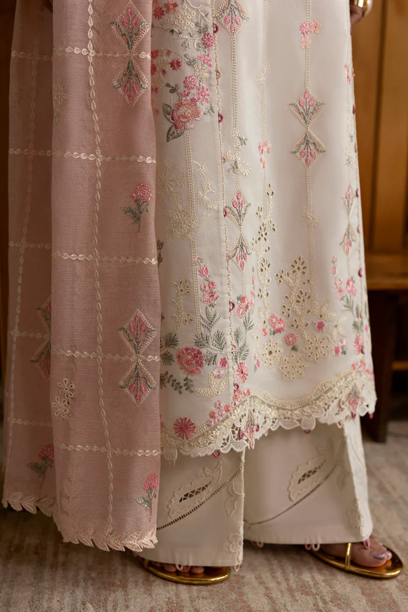 Model wearing cream DC-07 Tyrah from Qalamkar Qlinekari Lawn '25, Pakistani Luxury pret, Pakistani clothes online in UK.
