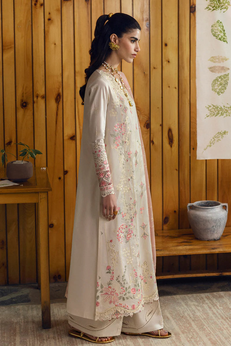 Model wearing cream DC-07 Tyrah from Qalamkar Qlinekari Lawn '25, Pakistani Luxury pret, Pakistani clothes online in UK.