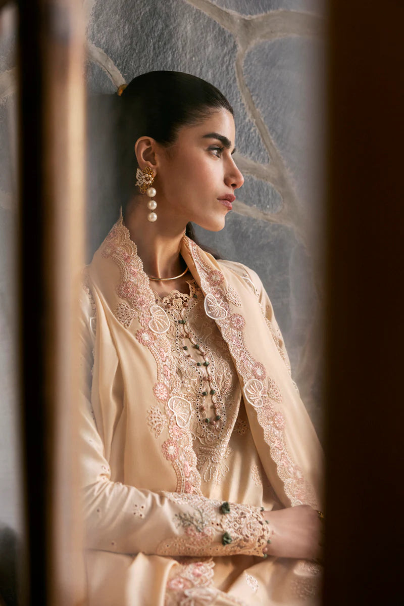 Model wearing beige DC-12 Disa from Qalamkar Qlinekari Lawn '25, Pakistani Luxury pret, Pakistani clothes online in UK.