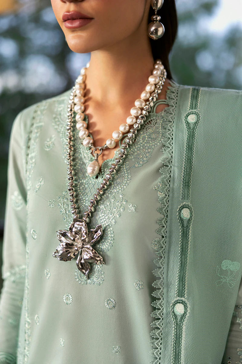 Model wearing mint green DC-15 Elira from Qalamkar Qlinekari Lawn '25, Pakistani Luxury pret, Pakistani clothes online in UK.