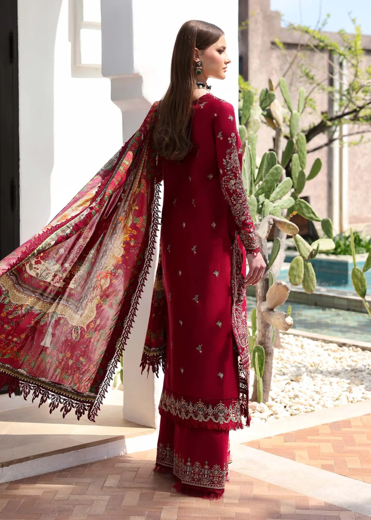 Model wearing deep red Marina outfit from Kanwal Malik Elysia Luxury Lawn '25, perfect for Pakistani luxury pret and clothes online in UK.