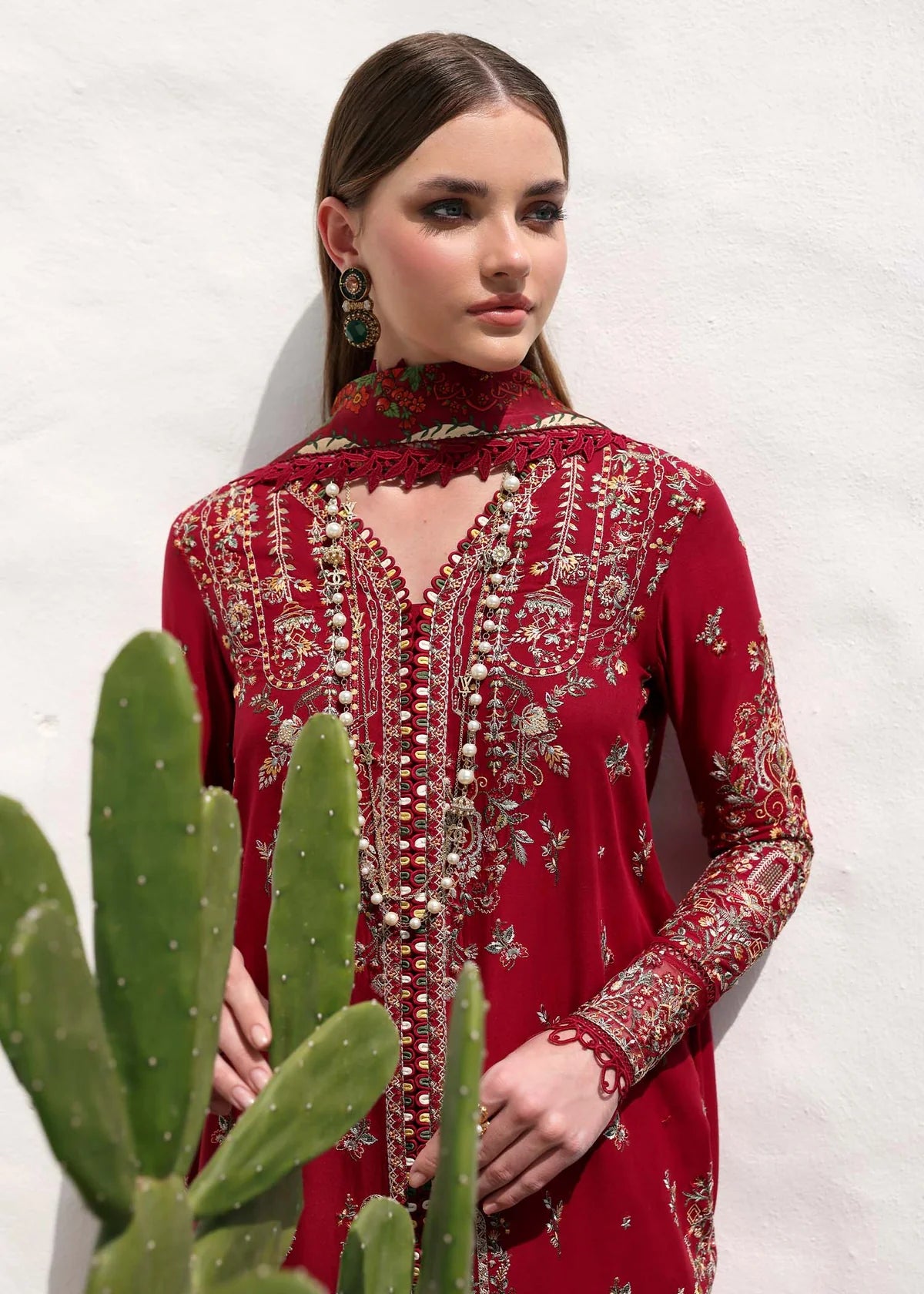 Model wearing deep red Marina outfit from Kanwal Malik Elysia Luxury Lawn '25, perfect for Pakistani luxury pret and clothes online in UK.