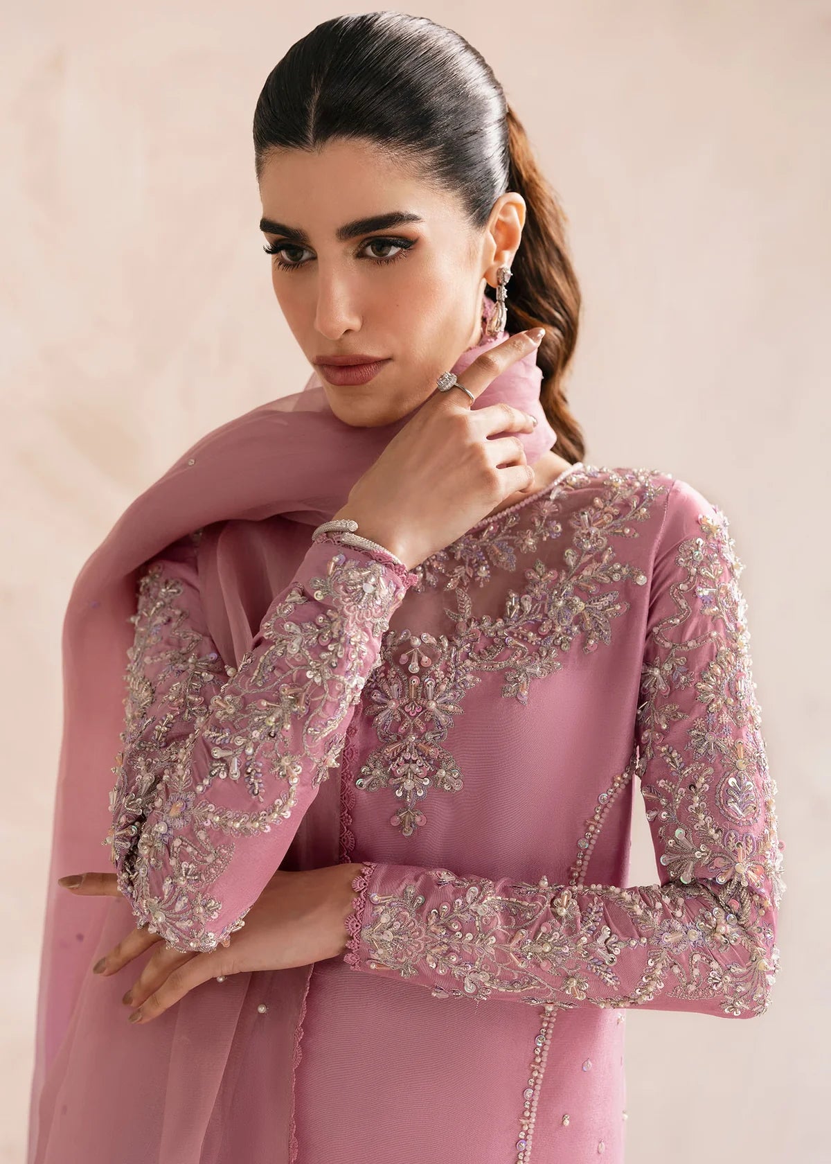 Model wearing Kanwal Malik Arden lilac embroidered luxury pret dress. Shop Pakistani clothes online in the UK for elegant occasion wear.