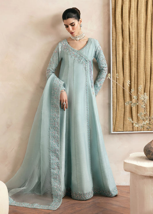 Model wearing Kanwal Malik Daisy pastel blue luxury pret dress. Shop Pakistani clothes online in the UK for festive and casual wear.