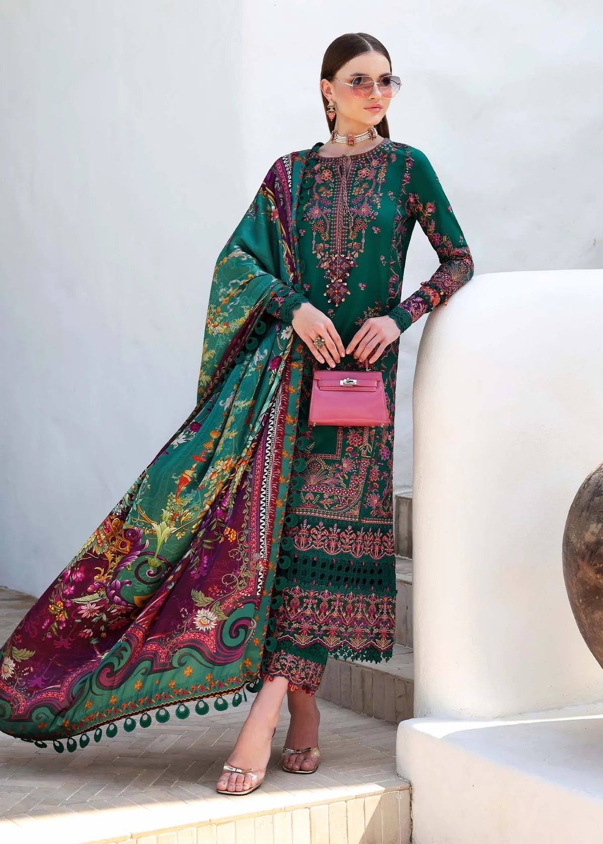 Model wearing deep green Sierra outfit from Kanwal Malik Elysia Luxury Lawn '25, ideal for Pakistani luxury pret and clothes online in UK.