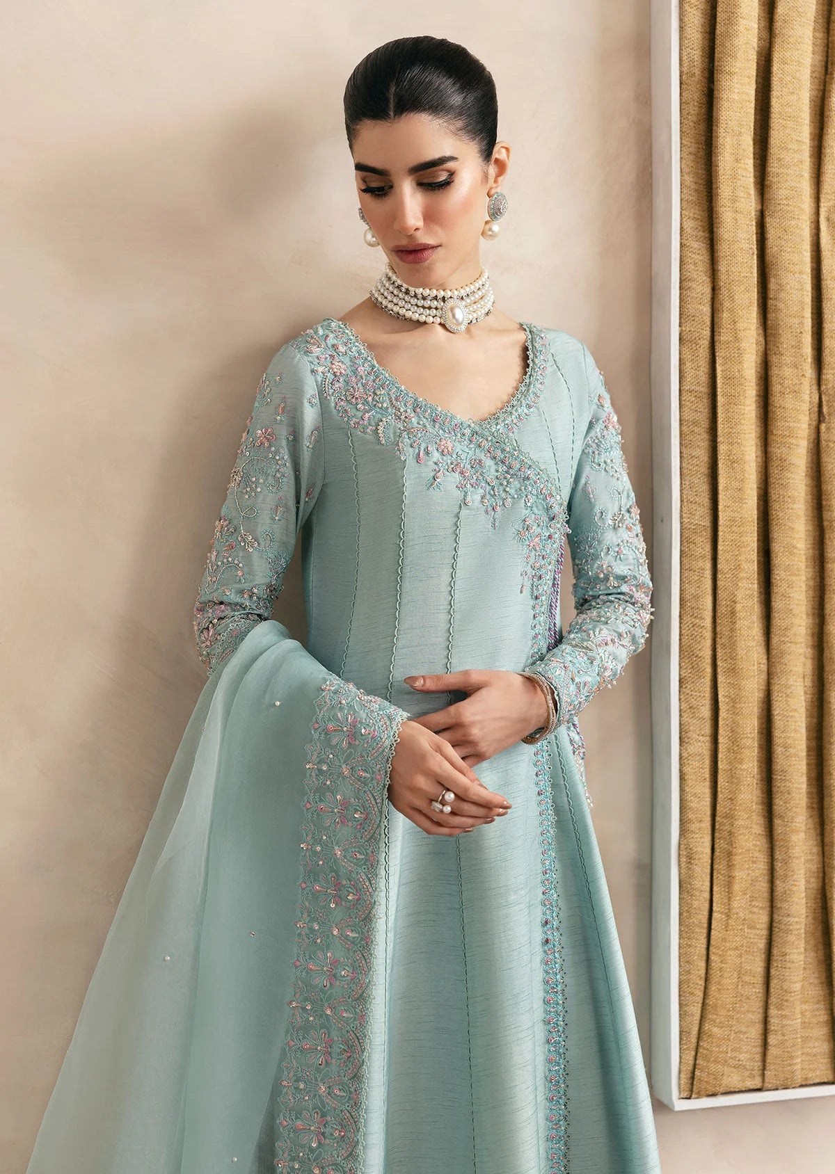 Model wearing Kanwal Malik Daisy pastel blue luxury pret dress. Shop Pakistani clothes online in the UK for festive and casual wear.