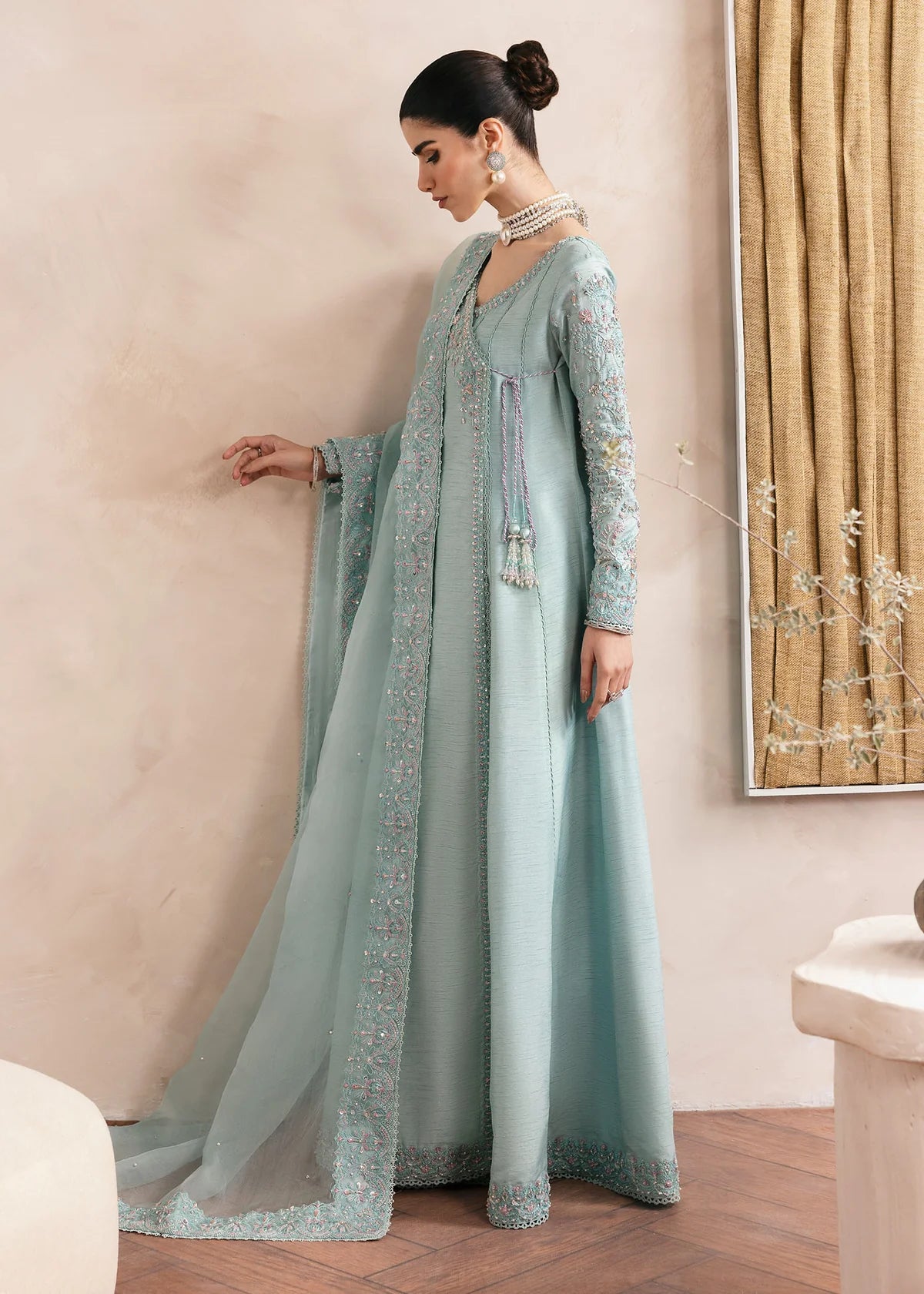 Model wearing Kanwal Malik Daisy pastel blue luxury pret dress. Shop Pakistani clothes online in the UK for festive and casual wear.