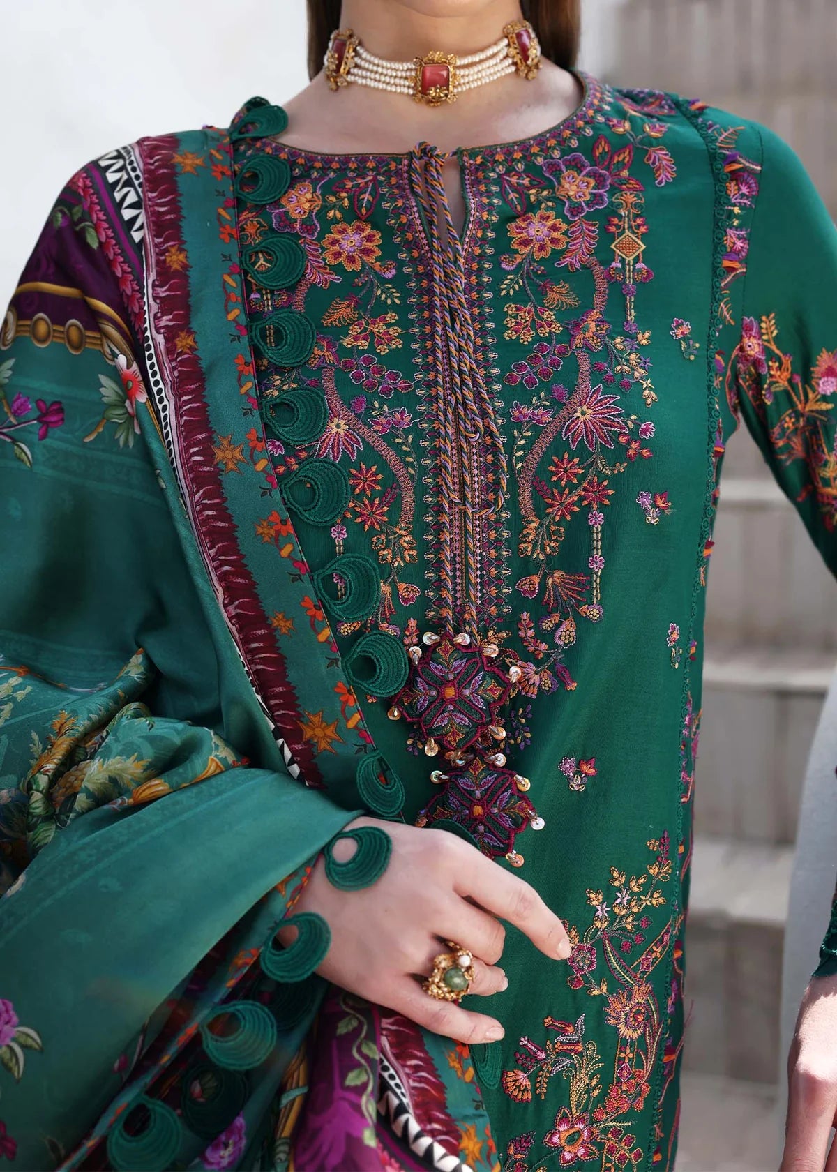 Model wearing deep green Sierra outfit from Kanwal Malik Elysia Luxury Lawn '25, ideal for Pakistani luxury pret and clothes online in UK.