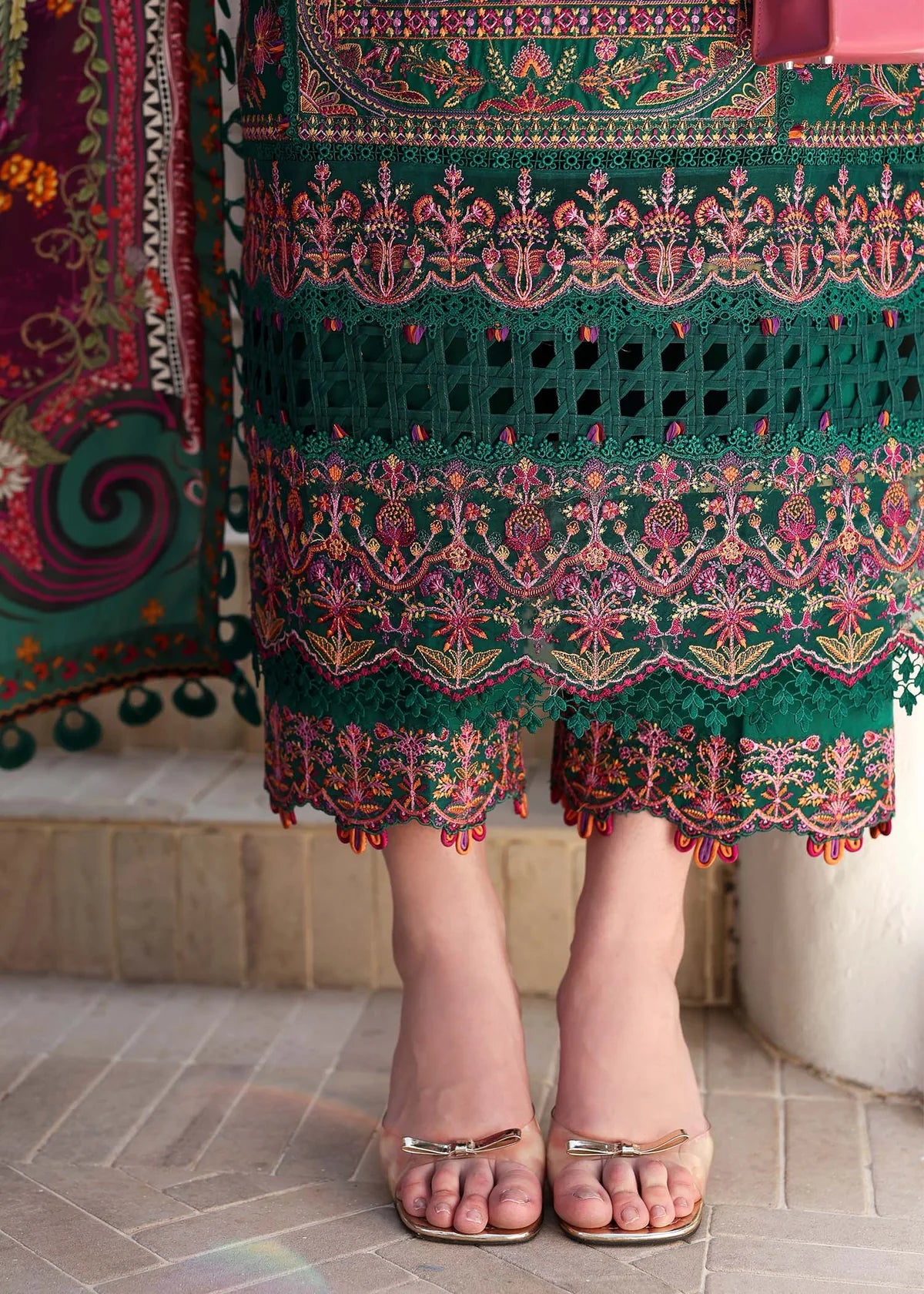 Model wearing deep green Sierra outfit from Kanwal Malik Elysia Luxury Lawn '25, ideal for Pakistani luxury pret and clothes online in UK.