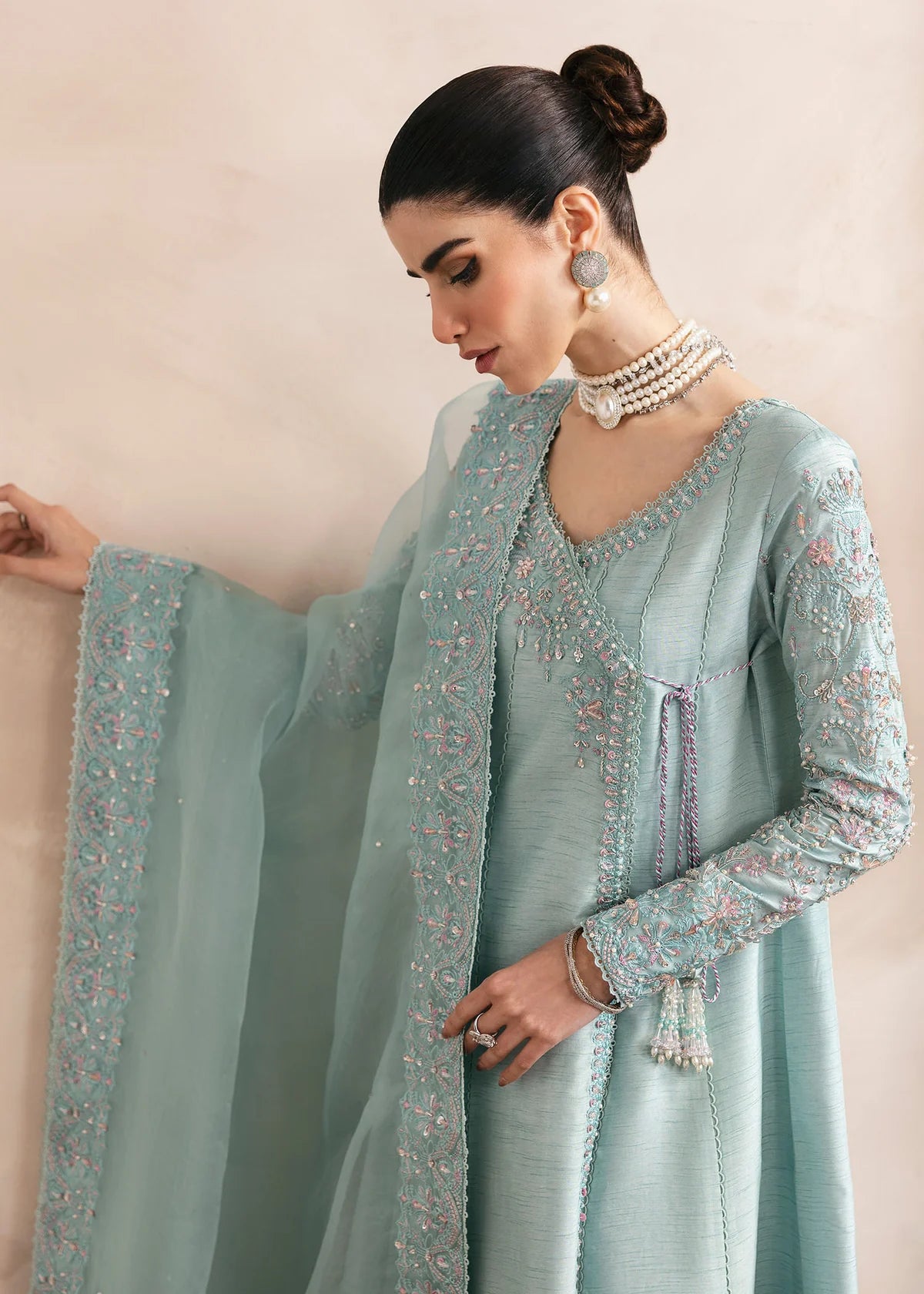 Model wearing Kanwal Malik Daisy pastel blue luxury pret dress. Shop Pakistani clothes online in the UK for festive and casual wear.